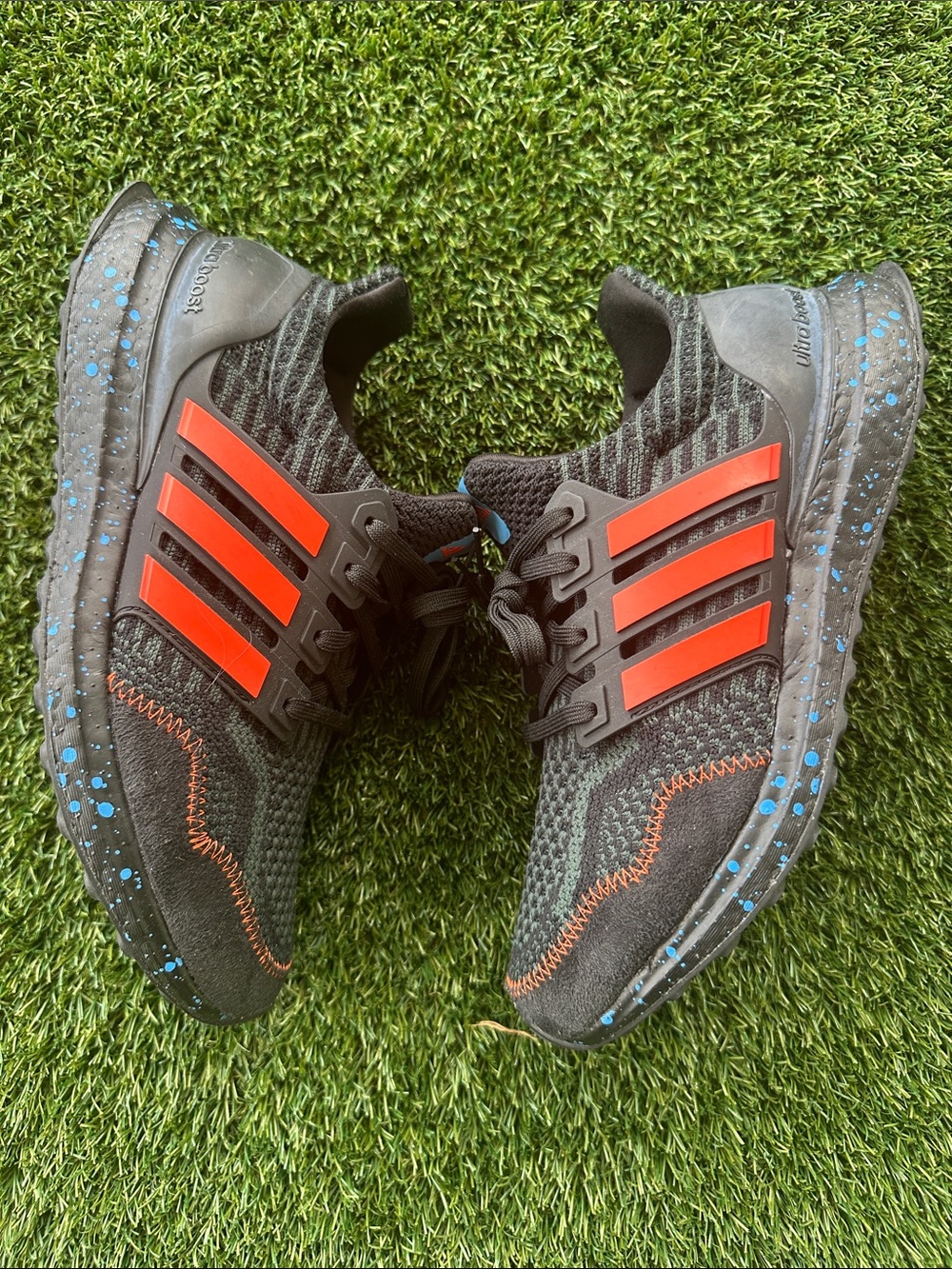 adidas Kids Black Sneakers with Orange Stripes and Blue Accents Ultra boost